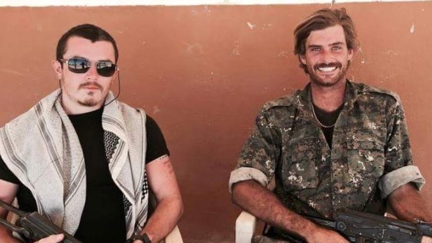 Dyball, left, is pictured here with fellow Australian Reece Harding, right, who was killed in Syria.