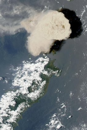 The Mount Ruang volcano erupts in 2002.