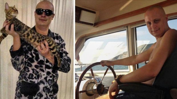 The FBI has offered a $US3 million bounty for the capture of Evgeniy Bogachev, seen holding his spotted Bengal cat while wearing a matching set of leopard-print pyjamas, and on one of his boats.