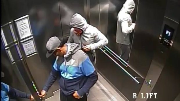 Images of men believed to be involved in the robbery of a luxury accessories store in Sydney.