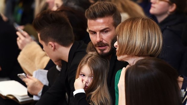Family affair: Former British soccer player David Beckham and his four kids attend Victoria Beckham's Mercedes-Benz Fashion Week Fall 2015 show in New York.