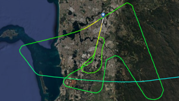 The Qantas flight from Brisbane was forced to circle for 40 minutes.