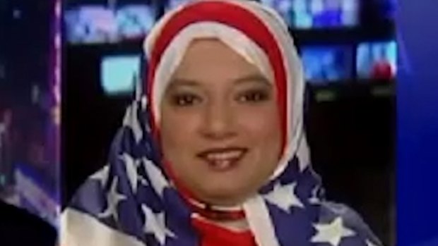 Saba Ahmed appearing as a panellist wearing an American flag as a hijab to prove her patriotism on the Fox News Channel's The Kelly Show last month.