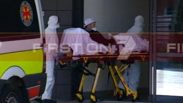 A man suspected of suffering from Ebola is rushed into the Gold Coast University Hospital.