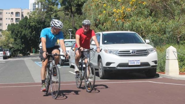 Roger Cook and Mark McGowan hit the road on their bikes 