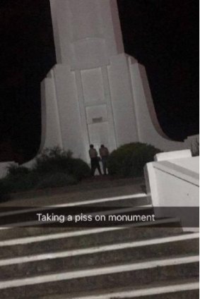 The image, posted to Snapchat, appears to show two men urinating on the the memorial. 