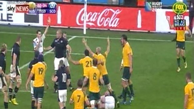 Last-gasp penalty: Craig Joubert blows in Australia's favour.