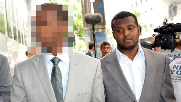 Yacqub Khayre (right) leaving a Melbourne court in 2010. He was acquitted of planning an alleged terrorist attack on the Holsworthy army base in Sydney. 