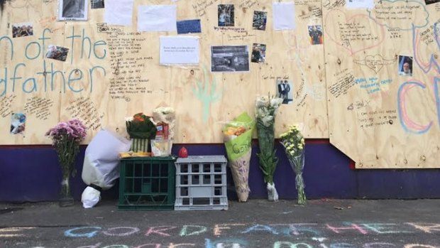 Tributes for Gordon Harvey - the 'Gordfather' - appeared outside his boarded-up shop.