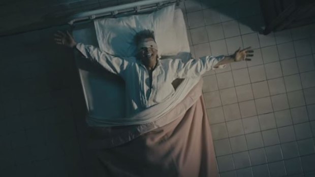 The video, Lazarus, shows Bowie in a hospital bed.
