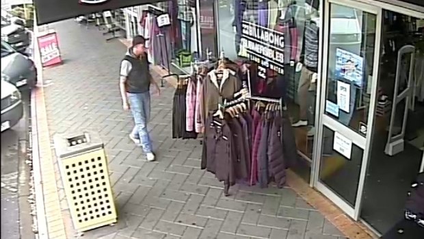 The man police wish to speak to, seen on CCTV in Horsham.