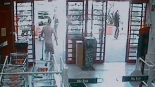 CCTV footage from a Bunnings Warehouse store shows a 
man, who police allege is Michael Peter Atkins, buying a mattock and gaffer tape.