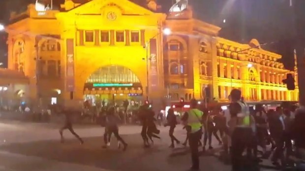 Apex gang rioters in Melbourne CBD, outside Flinders Street Station.