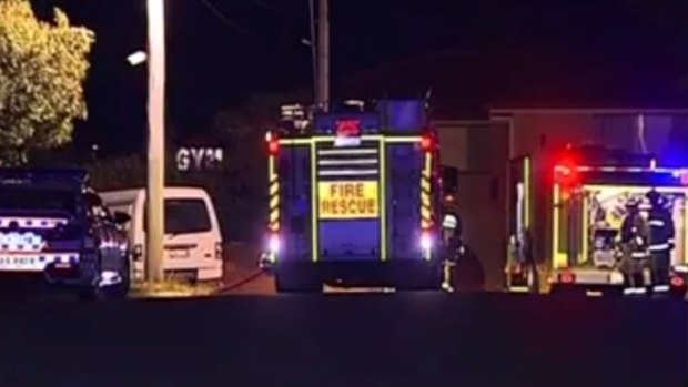 Emergency crews at the scene of a fatal unit fire in Beenleigh.