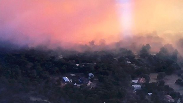 The fire was threatening homes in Perth's east.