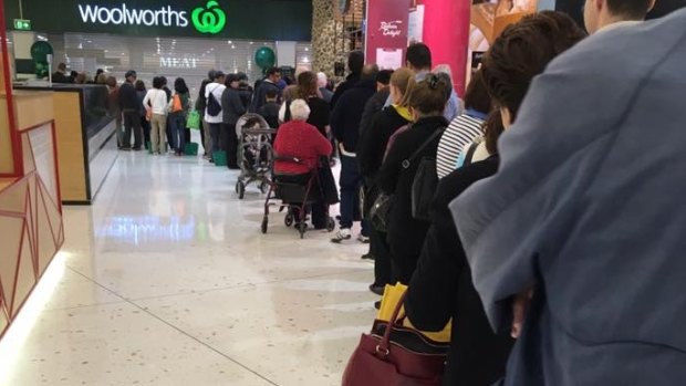 The queue outside Woolworths Top Ryde just before 8am.