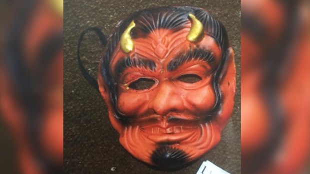 WA police say man wore this devil mask during the alleged robbery.