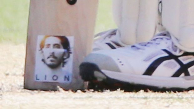 Lion-hearted: Mitchell Starc had a sticker of the Dev Patel movie on the bat he brandished to devastating effect at the MCG on Friday.
