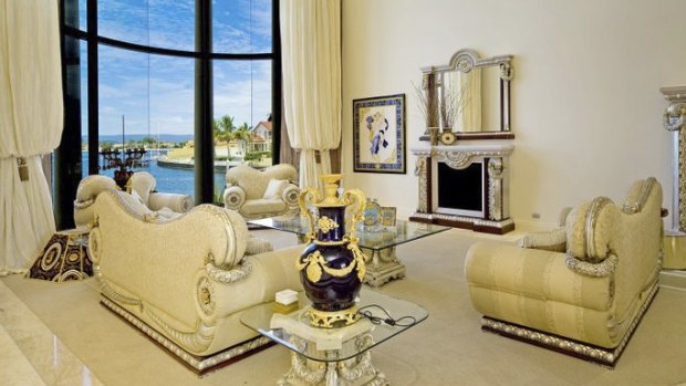 The property has been lavishly furnished with vast expanses of marble and chandeliers.