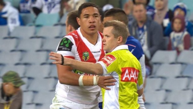 In trouble: Tyson Frizell touches referee Chris James on Friday night.