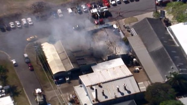 Neighbouring buildings were evacuated after a workshop caught fire in Bulimba.