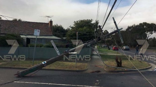 A street pole in Laverton that a hit-run driver crashed into on Saturday, causing power outages.