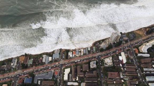 Water laps at properties on Sydney's coast on Monday morning.
