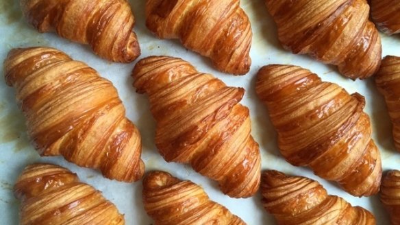 Biting the ear off a croissant avoids warping the layers, Reid says.
