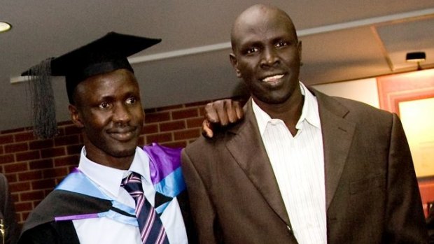 Deng Thiak Adut with his brother John Mac Acuek on his graduation from Western Sydney University.