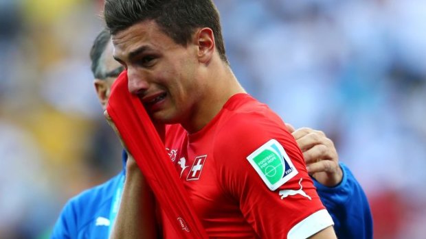 Heartbreak for Switzerland: Fabian Schar left in tears.