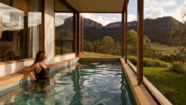 Guests can admire the landscape and wildlife from a heated pool. 