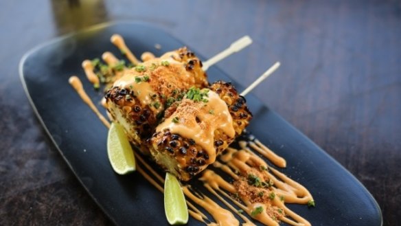 Char-grilled corn with chipotle mayo and toasted masa at The Black Toro.