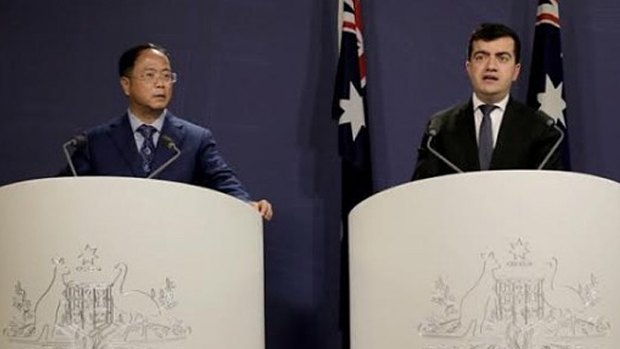 Huang Xiangmo and Sam Dastyari at a press conference for the Chinese community in Sydney on July 17, 2016.