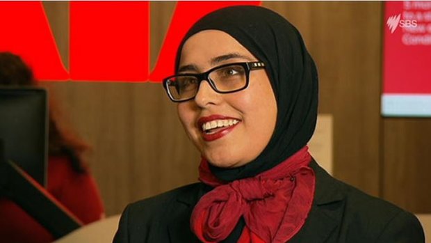 From next year Westpac bank teller Manija Akbari will wear a new corporate hijab to work.