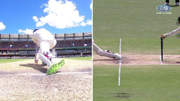 Line-ball decision: Moeen Ali is stumped by Tim Paine.