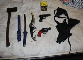 A variety of weapons were seized from the Red Hill home.