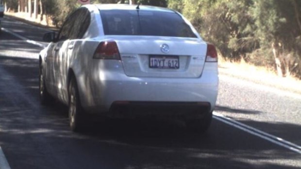 The vehicle involved has been described as a white 2010 Holden Commodore sedan, registration 1DYT 612.