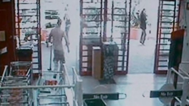 CCTV footage from Bunnings that shows a man, whom police allege is Michael Atkins, buying items including a mattock.