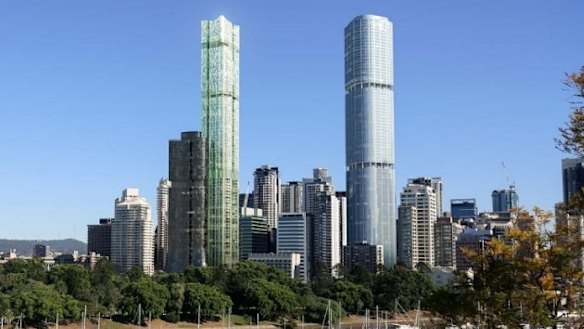 Both World Class Land's proposed tower (left) and the under-construction Skytower (right) will reach Brisbane's maximum 274-metre limit.