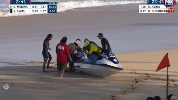 Bede Durbridge is lifted off the back of the rescue jet-ski.