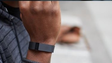 The FitBit Force uses sensors to track your walking and sleeping patterns.