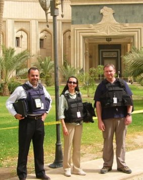 Kaldas in Iraq in 2005 with aid officials.
