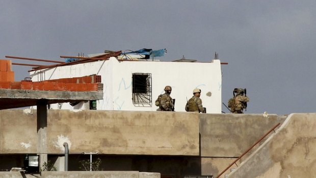 Tunisian security forces during the raid near Tunis in October in which five women, including Henda Saidi, 21, were killed.