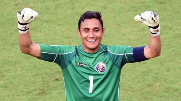Helped put his country on the map ... Costa Rica's goalkeeper Keylor Navas celebrates the victory over Italy. 