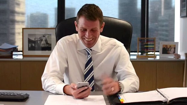 "That's actually quite clever": Mike Baird has a chuckle at one of the tweets in a still from the video.