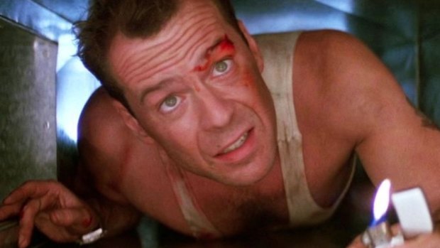 Bruce Willis in Die Hard (1988). The film's Christmas Eve setting has made it popular viewing at this time of year. But which city is it set in?