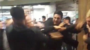 Vision of the wild brawl outside a Melbourne Central bar on Saturday night.