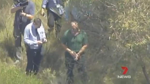 Vinzent Tarantino, accused of murdering schoolgirl Quanne Diec, leads police on a bush search in Bulli Tops, near Wollongong.