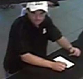 Police believe this man may be able to assist them with their investigation into an incident Mitchelton.