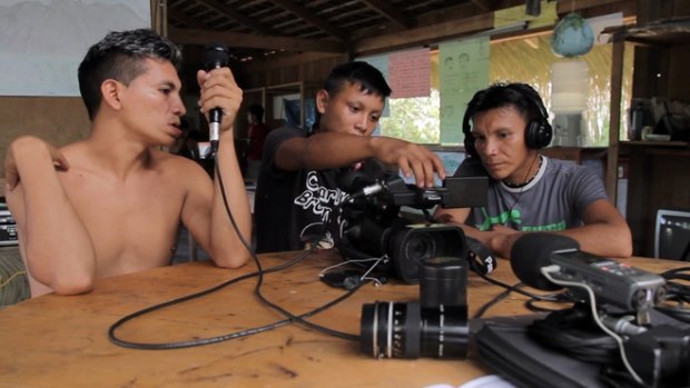 From left, Ricardo Pukimapiweiteri Yanomami, Silvano Ironasiteri Yanomami and Fabio Iximawateri Yanomami work on their audio visual skills.
